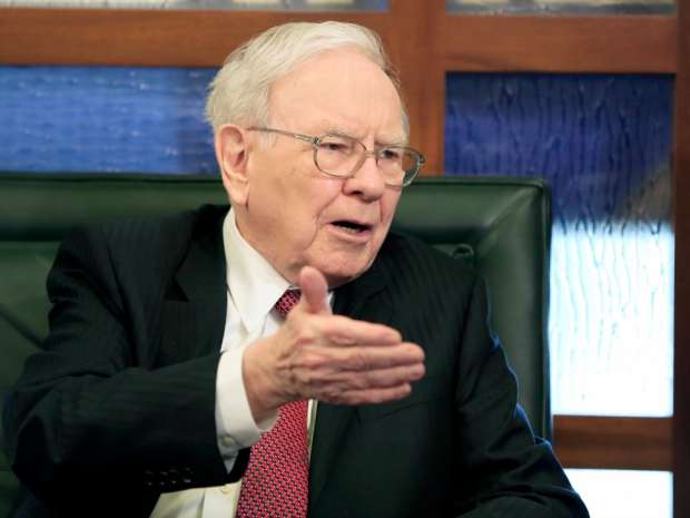 In this May 4, 2015 file photo, Berkshire Hathaway Chairman and CEO Warren Buffett speaks during an interview with Liz Claman on the Fox Business Network in Omaha, Neb. 